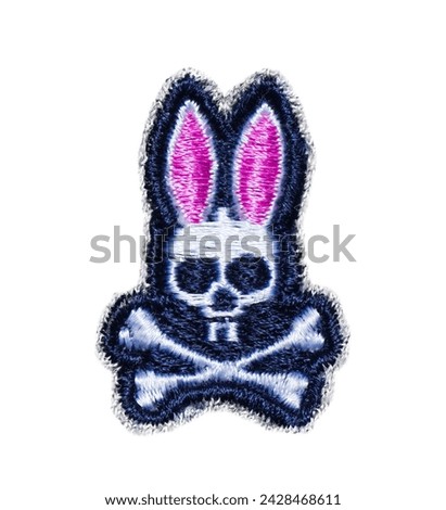 Psycho Bunny iconic logo Skull and crossbones with pink rabbit ears is a privately held mens clothing company based out of NYC New York City isolated on white background