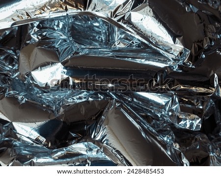 Silver plastic balloon texture for abstract glitter background.    