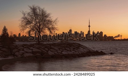 An early morning walk through Humber Bay Park West to view a sunrise across the metropolitan city of Toronto, Ontario, Canada