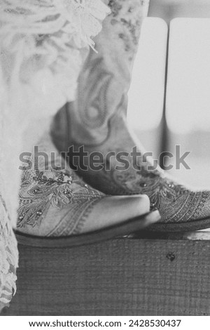 Cowgirl Wedding Boots and Details  Royalty-Free Stock Photo #2428530437