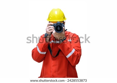 Photographer in yellow safety helmet and holding a camera isolated  on white background with copy space for text.