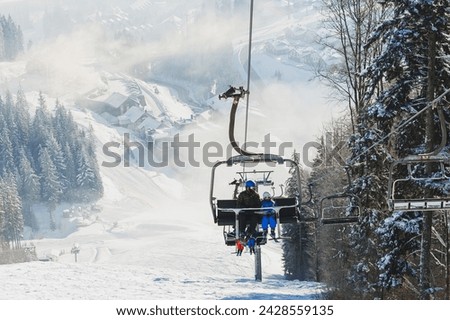 Winter landscape behind a snowy forest. Winter in the forest. Ski resort