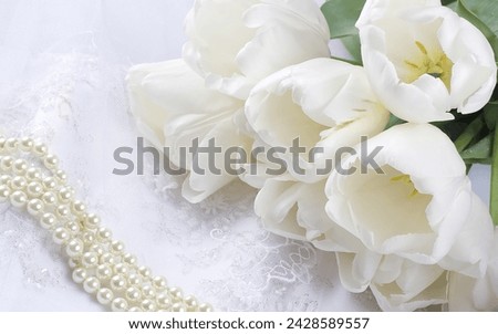Pearl Elegance: Fresh White Flowers Adorn a Pearl-Embellished Bridal Gown Royalty-Free Stock Photo #2428589557