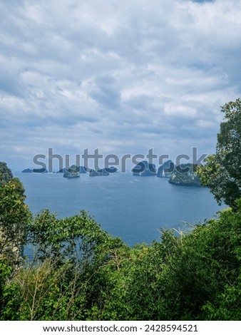 Hong Island view on many small islands around from the jungle on the way to 360 degree viewpoint. Panoramic photography.