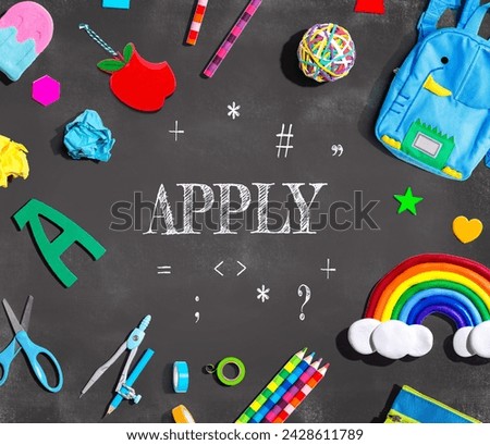Apply theme with school supplies on a chalkboard - flat lay Royalty-Free Stock Photo #2428611789
