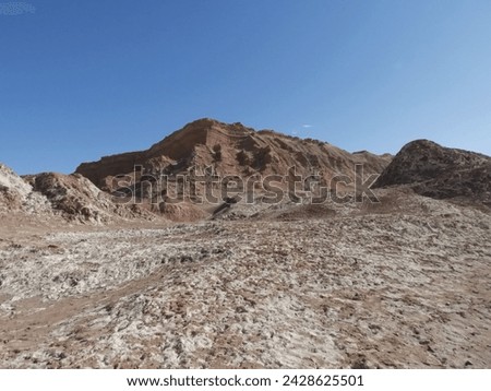 Rock formations in the desert under the bright blue sky