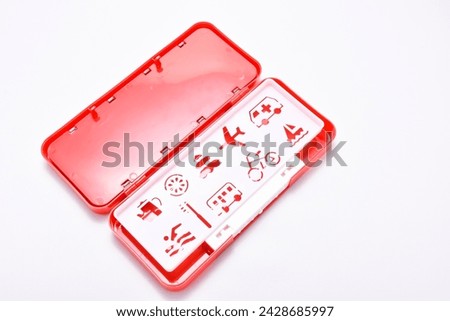 Red plastic pencil box with secret number lock. isolated on white background