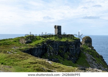 Moher Tower at Hag's Head with the ocean in the background, Cliffs of Moher, Ireland Royalty-Free Stock Photo #2428686995