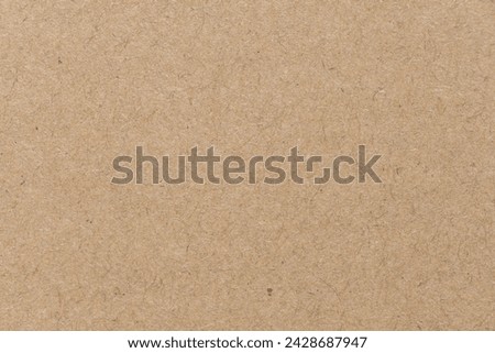 Close up of Old brown paper texture  visible. Paper fibers suitable for use as background images or decorations for advertisements.