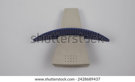 Paper stand clip for memo with blue color, and top side.
