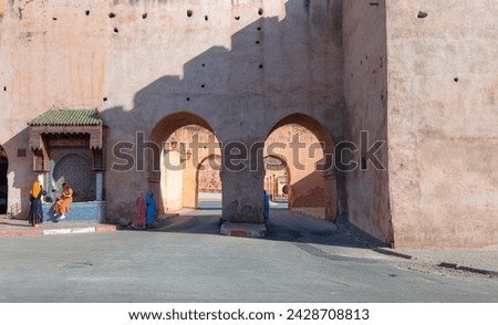 Unidentified people walking in the street of Meknes, Morocco Royalty-Free Stock Photo #2428708813