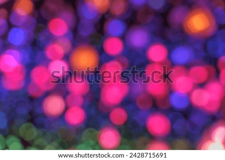 Abstract image of blurred colorful lights balls, blue, pink and orange