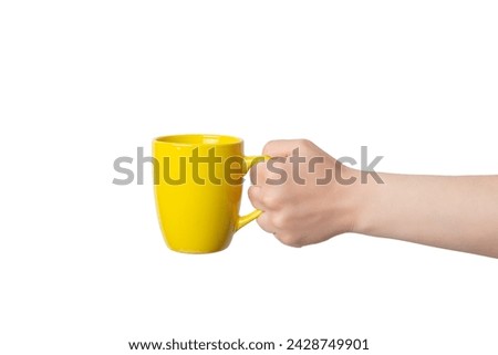 Hand presents a yellow mug, perfect for Print-on-Demand design promotion. Isolated and customizable, ideal for showcasing personalized creations