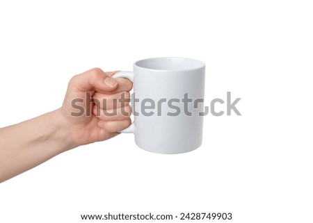 Isolated hand holds a blank white mug, ready for Print-on-Demand design promotion. Versatile, customizable, and ideal for showcasing personalized creations Royalty-Free Stock Photo #2428749903