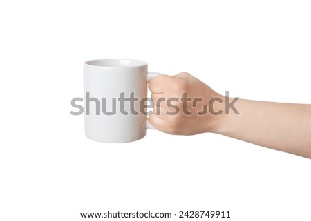 Blank white mug, held by an isolated hand, offers endless possibilities for Print-on-Demand design promotion. Versatile and customizable canvas Royalty-Free Stock Photo #2428749911