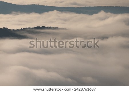 Low clouds inversion, clouds wave in autumn, aerial photo Royalty-Free Stock Photo #2428761687