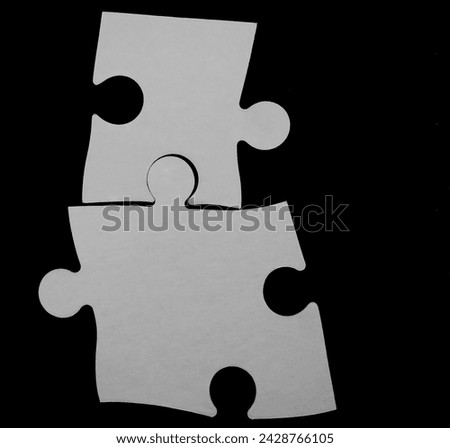 2 two black carton jigsaw puzzles isolated on white background. Double piece flat puzzle. Two section compare service banner.