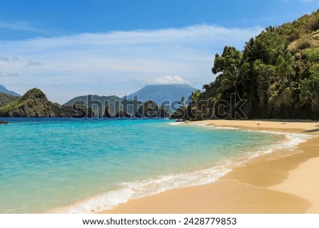Lovely mahoro island beach with masare and karangetang volcano beyond, mahoro, siau, sangihe archipelago, north sulawesi, indonesia, southeast asia, asia Royalty-Free Stock Photo #2428779853