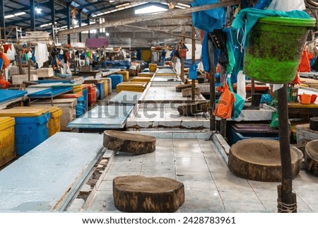 Batu 9 Fish Market, also known as Bintan Center Market. In one of the most famous fish markets in Tanjungpinang, the fish boxes are neatly organized and labeled with letters to prevent mix-ups