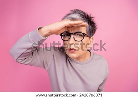Close up photo of grey short haircut business woman searching employee who steal corporate budget isolated on pink color background