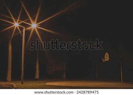 The Basketball Court with Streetlights at night