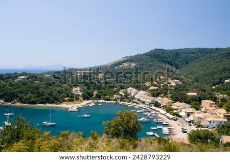 View looking down on the harbour at ayios stefanos, northeast coast, corfu, ionian islands, greek islands, greece, europe Royalty-Free Stock Photo #2428793229