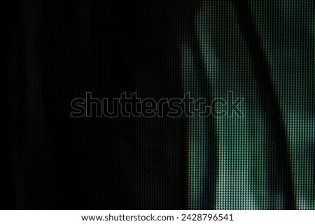 Detailed close-up of an LCD screen, abstract dark green black background texture with visible pixel grid, backdrop, wallpaper, nobody. Spooky scary creepy digital tech backgrounds concept, no people