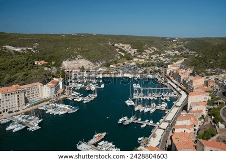 An aerial view of the harbour and rooftops in bonifacio, corsica, france, mediterranean, europe