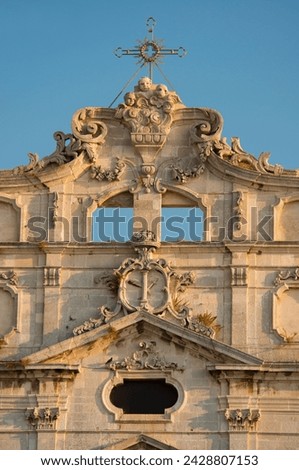 The baroque facade of santa lucia alla badin in the duomo square, ortigia, syracuse, sicily, italy, europe