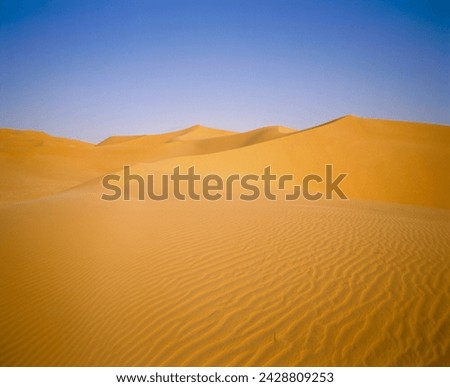Sand dunes of the grand erg occidental, sahara desert, algeria Royalty-Free Stock Photo #2428809253