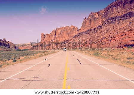 Road to Canyonlands National Park in Utah, USA. Retro color filtered toned style photo. Royalty-Free Stock Photo #2428809931