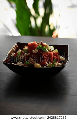 salad dish in high resolution image and isolated with blurry ends and assemble in dark room