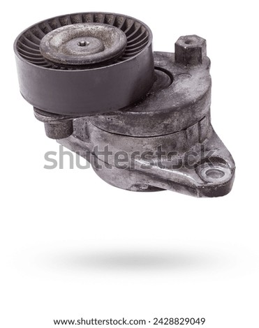 V-belt tensioner for attachments of an internal combustion engine of a car. Used auto parts catalog Royalty-Free Stock Photo #2428829049