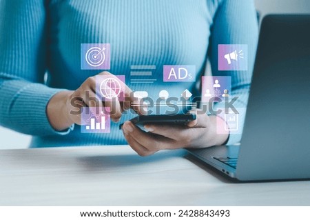 Digital online sales concept, businessman using laptop with website advertisement digital marketing Digital marketing and online advertising to target customers Royalty-Free Stock Photo #2428843493
