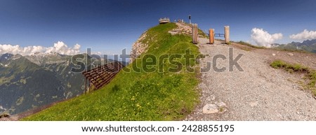 Panoramic view of viewpoint on top of mountain Mannlichen in Swiss Alps, Switzerland