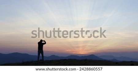 Photos at sunset. Man photographing the sunset in euskadi.