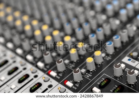 Mixer control. Music engineer. Backstage controls on an audio mixer, Sound mixer. Professional audio mixing console with lights, buttons, faders and sliders. sound check for concert. Royalty-Free Stock Photo #2428867849