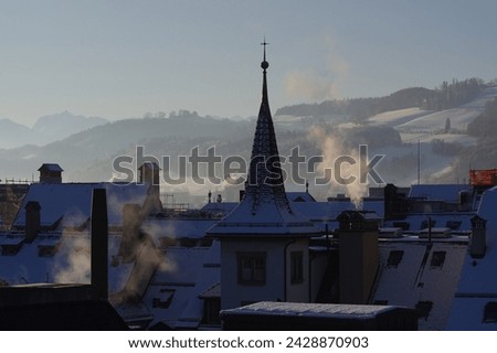 Heating Fumes emanating from Chimneys in Bern, Switzerland Royalty-Free Stock Photo #2428870903