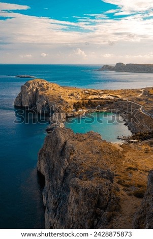 Aerial view on Saint Paul's bay in Lindos, Rhodes, Greece. Royalty-Free Stock Photo #2428875873