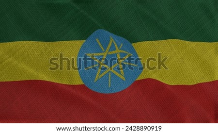 Flag of Ethiopia, Fabric flag of Ethiopia, Ethiopia flag waving in the wind . National symbol of Ethiopia country.