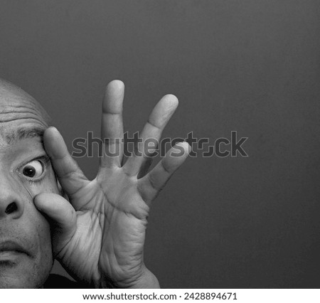 man looking with open eyes with people stock image stock photo