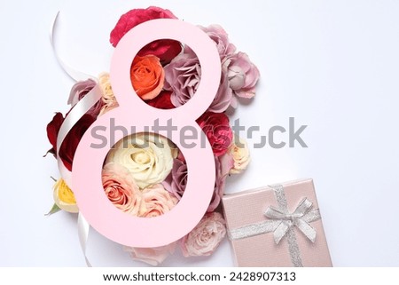 8 March greeting card design with roses and gift box on white background, top view. Happy International Women's Day