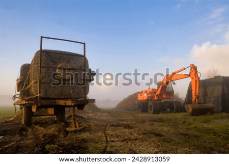 Heavy equipment on a farm near Heeten Royalty-Free Stock Photo #2428913059