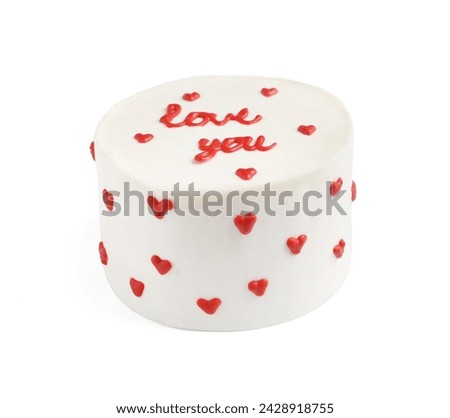 Bento cake with text Love You isolated on white. St. Valentine's day surprise