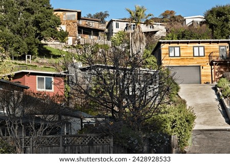 Multiple Houses Perched on a Hillside in Marin County Royalty-Free Stock Photo #2428928533