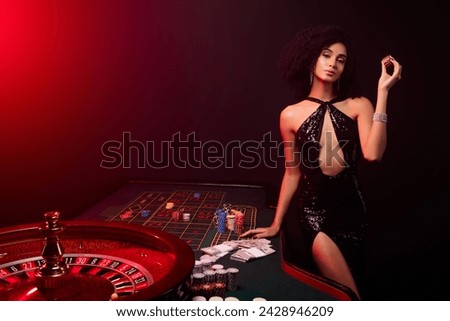 Photo of chic girl croupier in poker private club announce professional shark about winning holdem wager jackpot Royalty-Free Stock Photo #2428946209