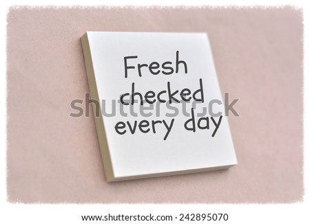 Text fresh checked every day on the short note texture background