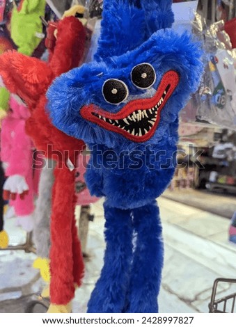 
Blue Huggy Wuggy Doll with Sharp Teeth