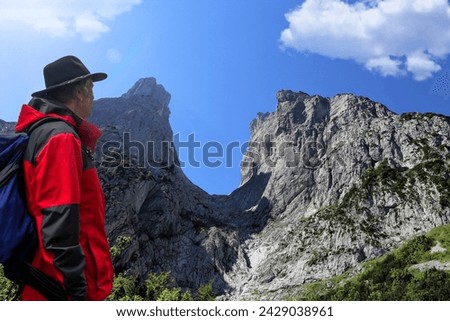 Symbolic image: Hiker on the Wilder Kaiser, Tyrol (Composing, model released)