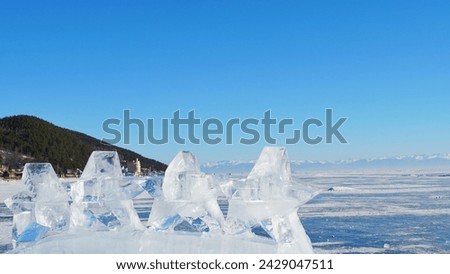 Ice on frozen lake during winter season.  Royalty-Free Stock Photo #2429047511